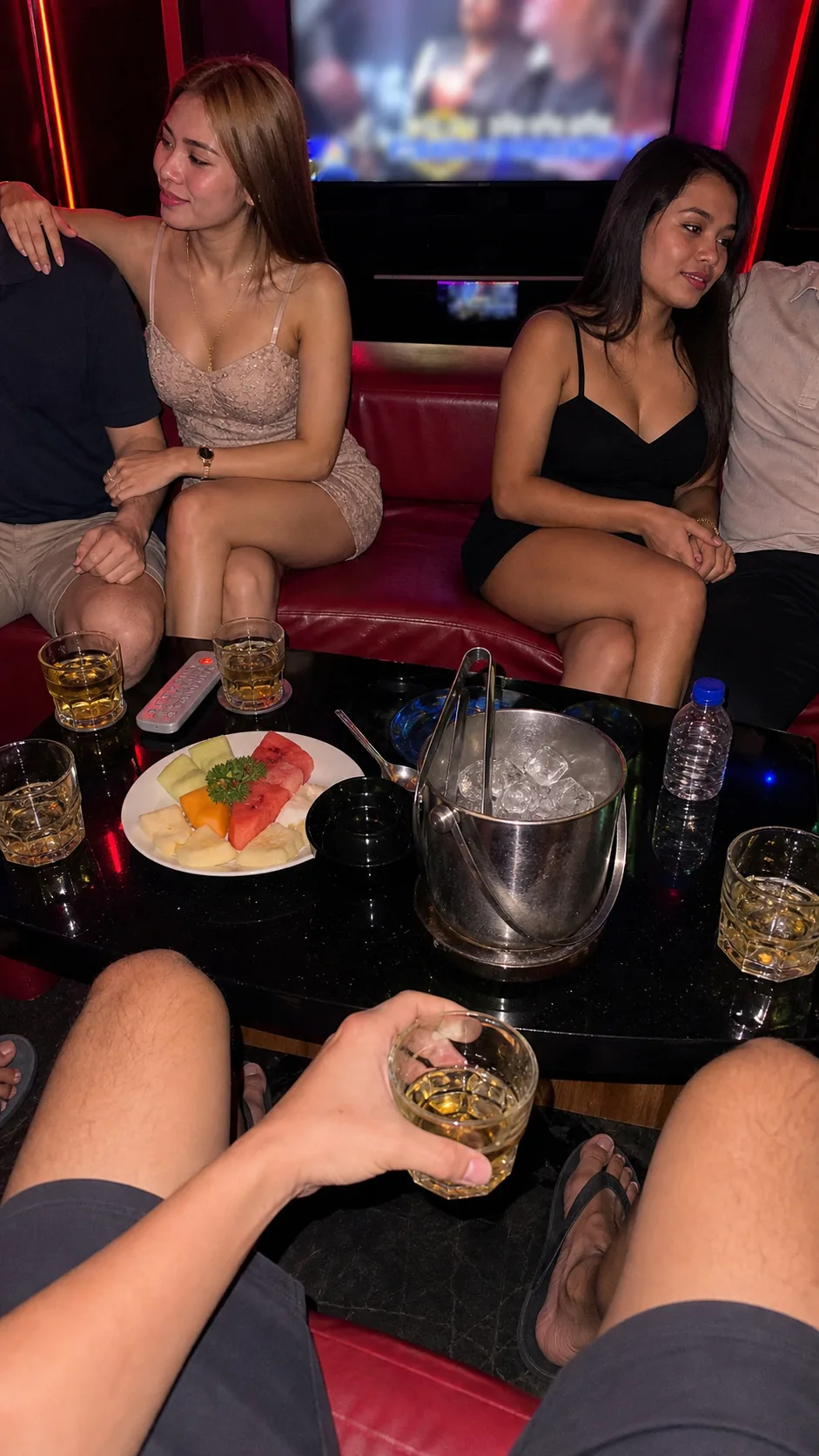 KTV paired toast scene with male faces hidden or cropped